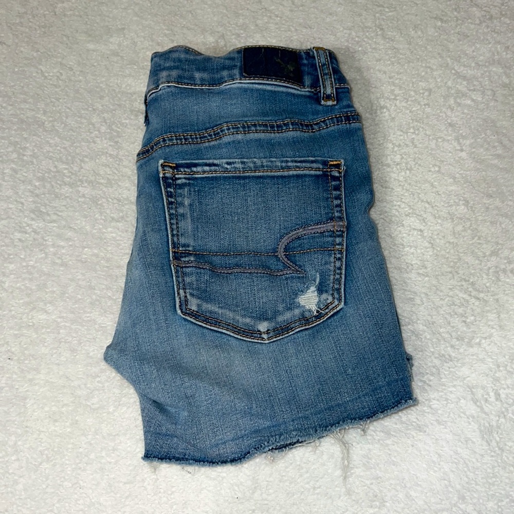 Ripped denim shorts - Picture 2 of 2